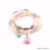 lot de 3 bracelets élastiques cristal pompon tassel tissu 0218034 rose nude