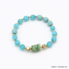 bracelet plage élastique pierre naturelle nacre métal femme 0220090