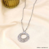 Collier acier inoxydable pendentif antique anneaux martelés femme 0123057 argenté