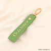 Bijou de sac porte-clés fantaisie "Clé du bonheur" simili-cuir grainé 0823005 vert