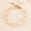 Bracelet cérémonie perles acryliques et métal pour femme 0223151 blanc