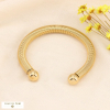 Bracelet jonc tube effet ressort en acier inoxydable 0223157 doré