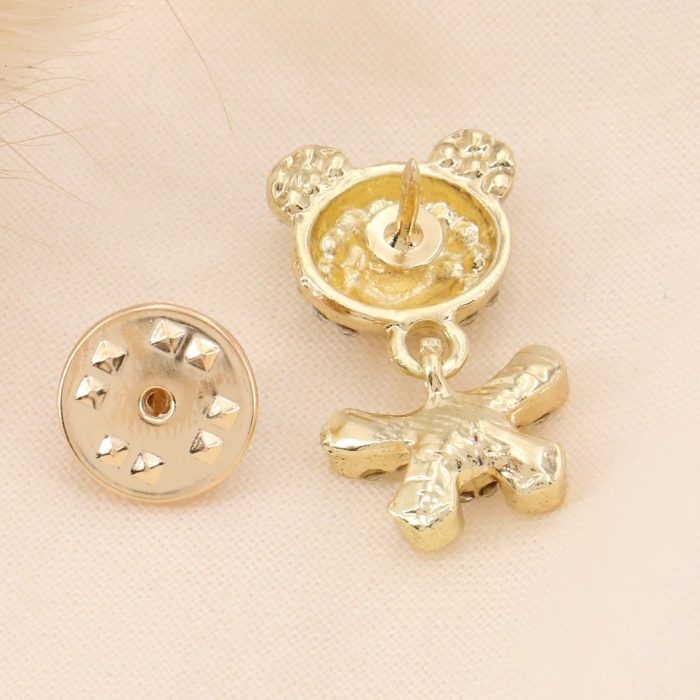 Lot x2 pin's nounours articulé en métal et strass blancs pour femme 0623511 doré