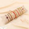 Ensemble de 10 bracelets acier inoxydable pierre strass acrylique femme 0223622 rouge corail