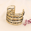 Bracelet manchette multi-brins ajustable en acier inoxydable et perles facettées en cristal 0223609 noir