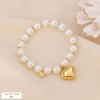 Bracelet élastique acier inox coeur grosses perles d'imitation 0224110 blanc