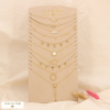 Ensemble 10 colliers acier inoxydable nuance blanc présentoir 0124197 doré