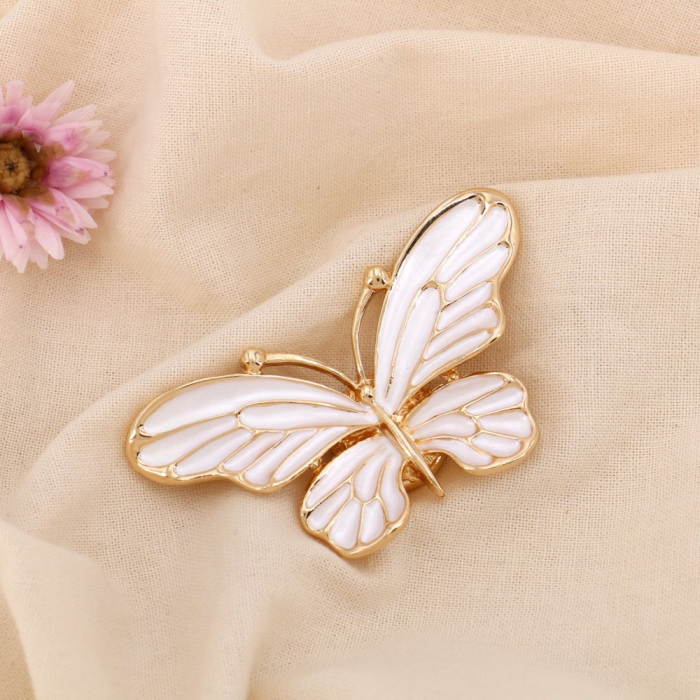 Broche aimantée papillon métal émail femme 0524514 blanc