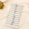 Ensemble 12 bracelets coulissant œil émail 0225247 taupe