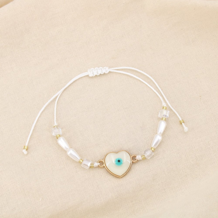 Ensemble 12 bracelets coulissant œil résine cristal 0225248 blanc