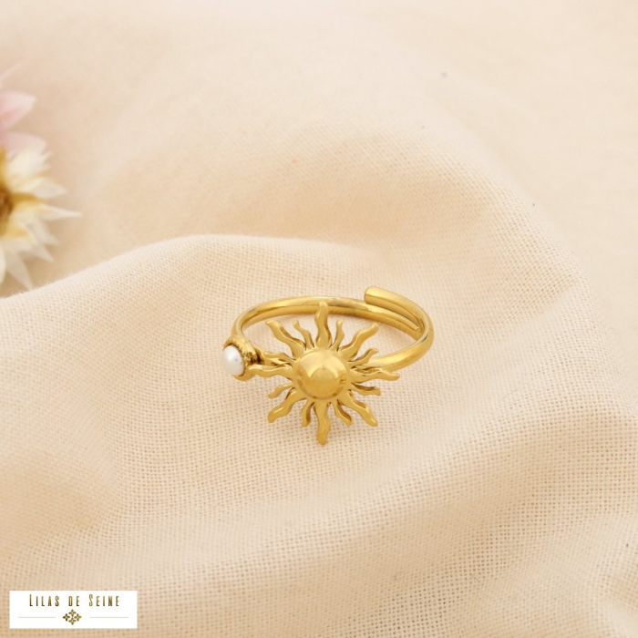 Bague acier inoxydable soleil perle acrylique 0425075 doré