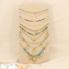 Ensemble 10 colliers acier pampilles nacre floral 0125181 bleu turquoise