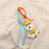 Bijou de sac ou porte-clés chien synthétique cordon 0825035 jaune