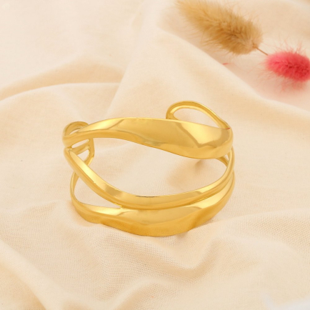 Bracelet manchette ondulé ajouré acier inoxydable 0225532 doré