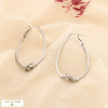 Boucles d'oreilles créoles acier inoxydable nœud 0325517 argenté