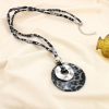 Collier sautoir léopard métal résine polyester 0125572 noir