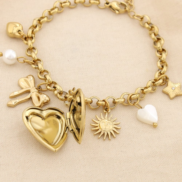 Bracelet acier breloque nacre perle cœur soleil 0225579 doré