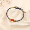 Bracelet ethnique tressé coulissant polyester 0225586 bleu foncé