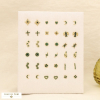 Ensemble 18 puces d'oreilles acier inoxydable strass 0325553 vert