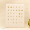 Ensemble 18 puces d'oreilles acier inoxydable strass 0325553 doré