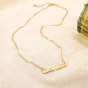 Collier acier inoxydable barre texturée martelée 0125593 doré