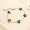 Bracelet en acier inoxydable fleurs bille facettée cristal 0224092 vert foncé