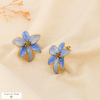 Boucles d’oreilles fleur stylisée émail acier inox. 0326026 bleu ciel