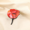 Broche épingle vintage résine marbrée fleur stylisée 0526012 rouge bordeaux