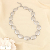 Collier acier maillon ovale gravé losange rayonnant 0126022 argenté