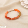 Bracelet jonc élastique LOVE résine marbrée acier 0226111 orange