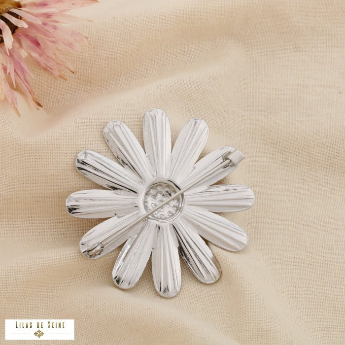 Broche à épingle marguerite stylisée acier inox. 0526021 argenté