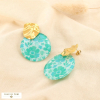 Boucles d’oreilles acier martelé résine florale 0326135 bleu turquoise