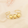 Bracelet jonc acier inoxydable structuré boules 0226085 doré