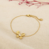Bracelet acier inoxydable strass motif papillon 0226100 doré