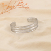 Bracelet jonc ouvert acier inoxydable ajouré martelé 0226078 argenté