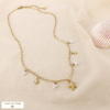 Collier étoile de mer acier inox perles acryliques 0126160 doré