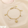 Bracelet étoile de mer acier inox perles acryliques 0226183 doré
