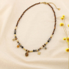 Collier acier breloque pierres nacre cristal étoile 0126575 marron