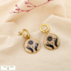 Boucles d’oreilles acier émail résine mains astre 0326527 doré