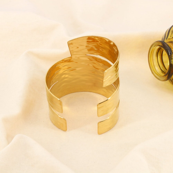 Bracelet manchette acier graphique ajouré martelé 0226505 doré